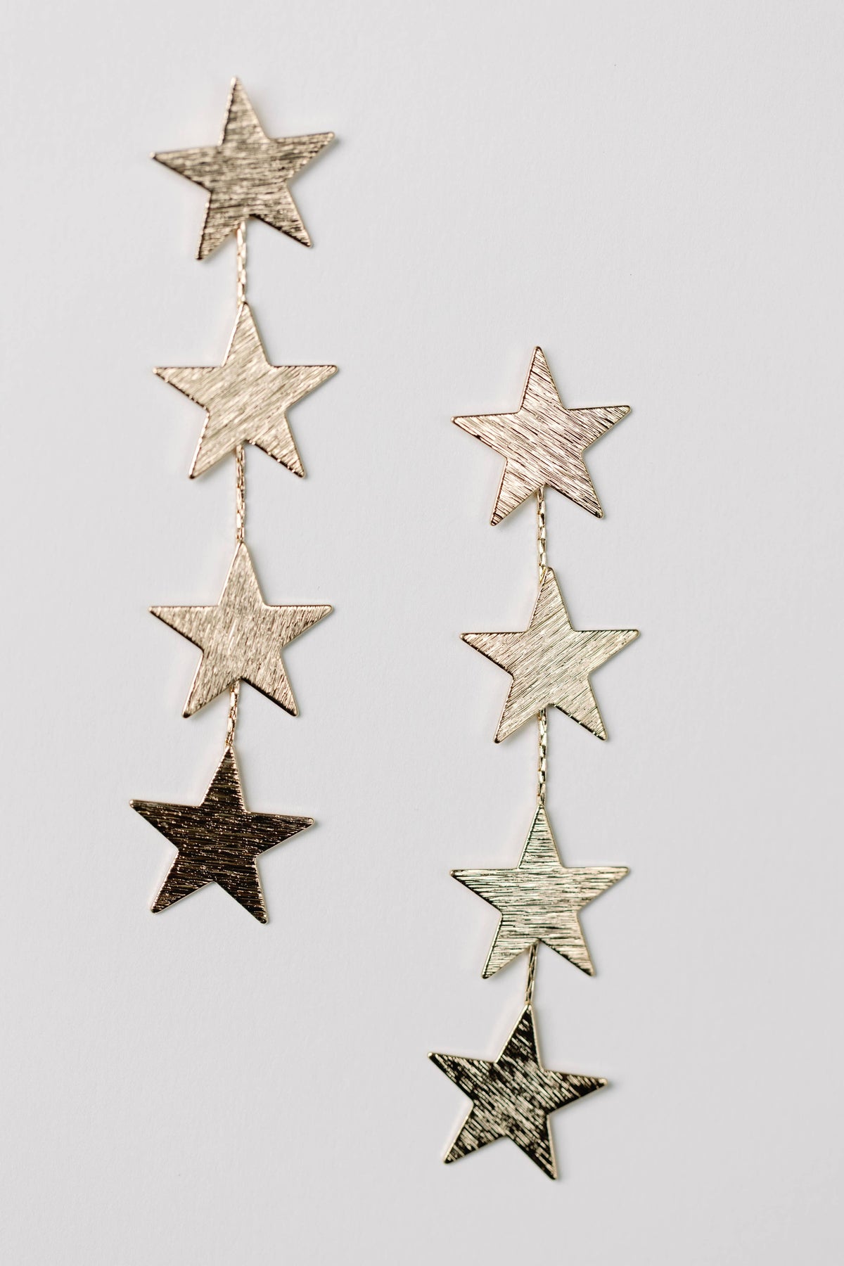 Gold Star Duster Drop Statement Earrings